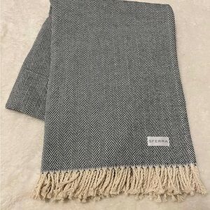 NWOT SFERRA  100% COTTON NAVY HERRINGBONE THROW BLANKET 51” X 71”.